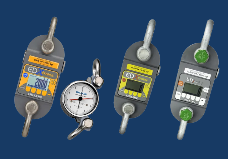 Four digital timer devices and one analog timer on a blue background