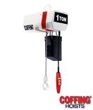Red and white Coffing hoist with chains, hooks, and 