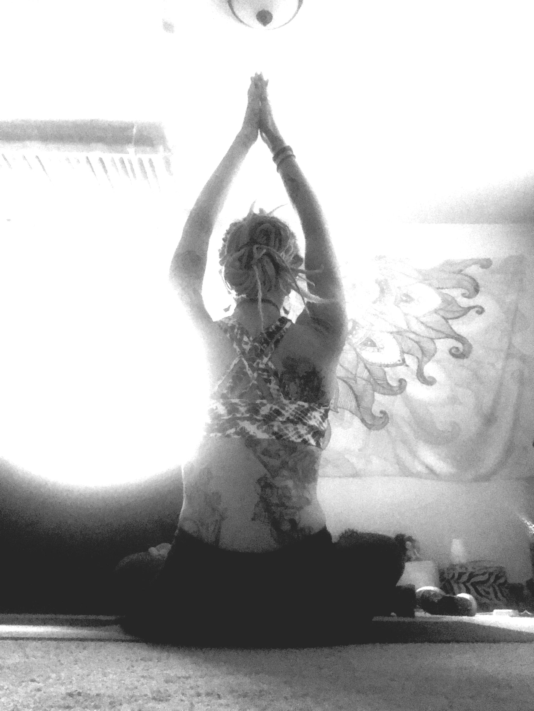 black and white image sitting in lotus pose
