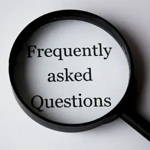 Magnifying glass over the words “Frequently asked Questions” on a white background