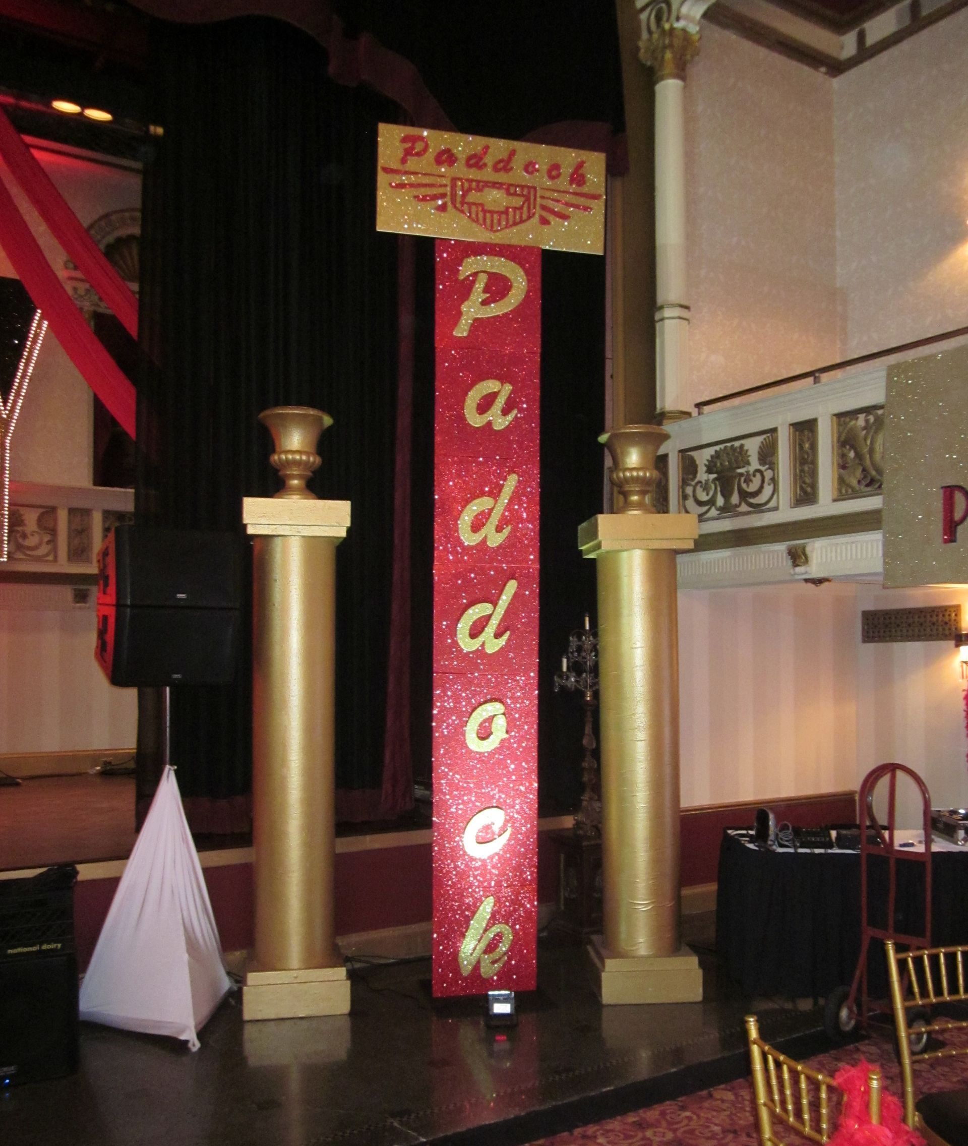 The word paddock that is on a sign