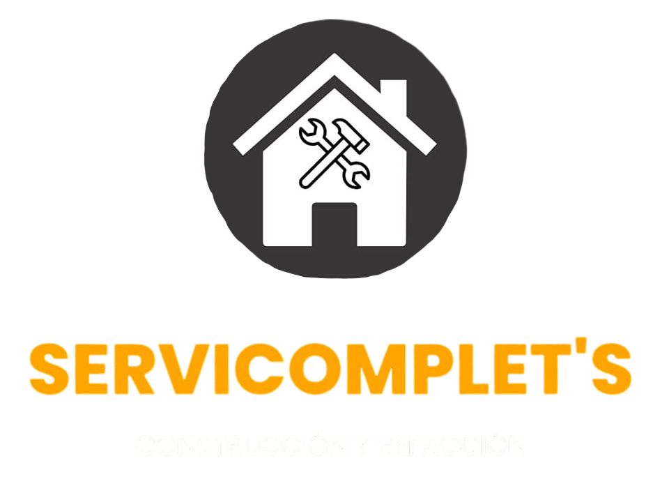 Logotipo de SERVICOMPLET con una casa blanca, una llave inglesa y un destornillador en un círculo oscuro sobre fondo blanco.