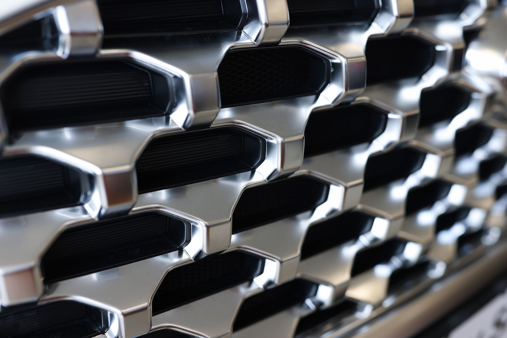 A close up of the front grill of a car.