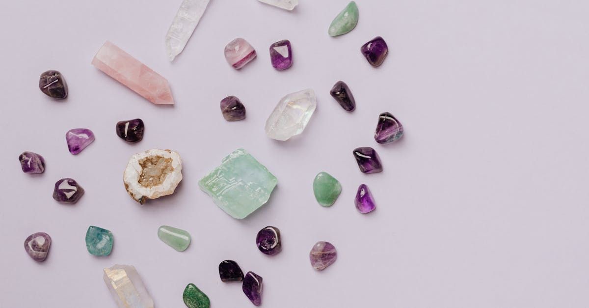 There are many different types of crystals on the table.
