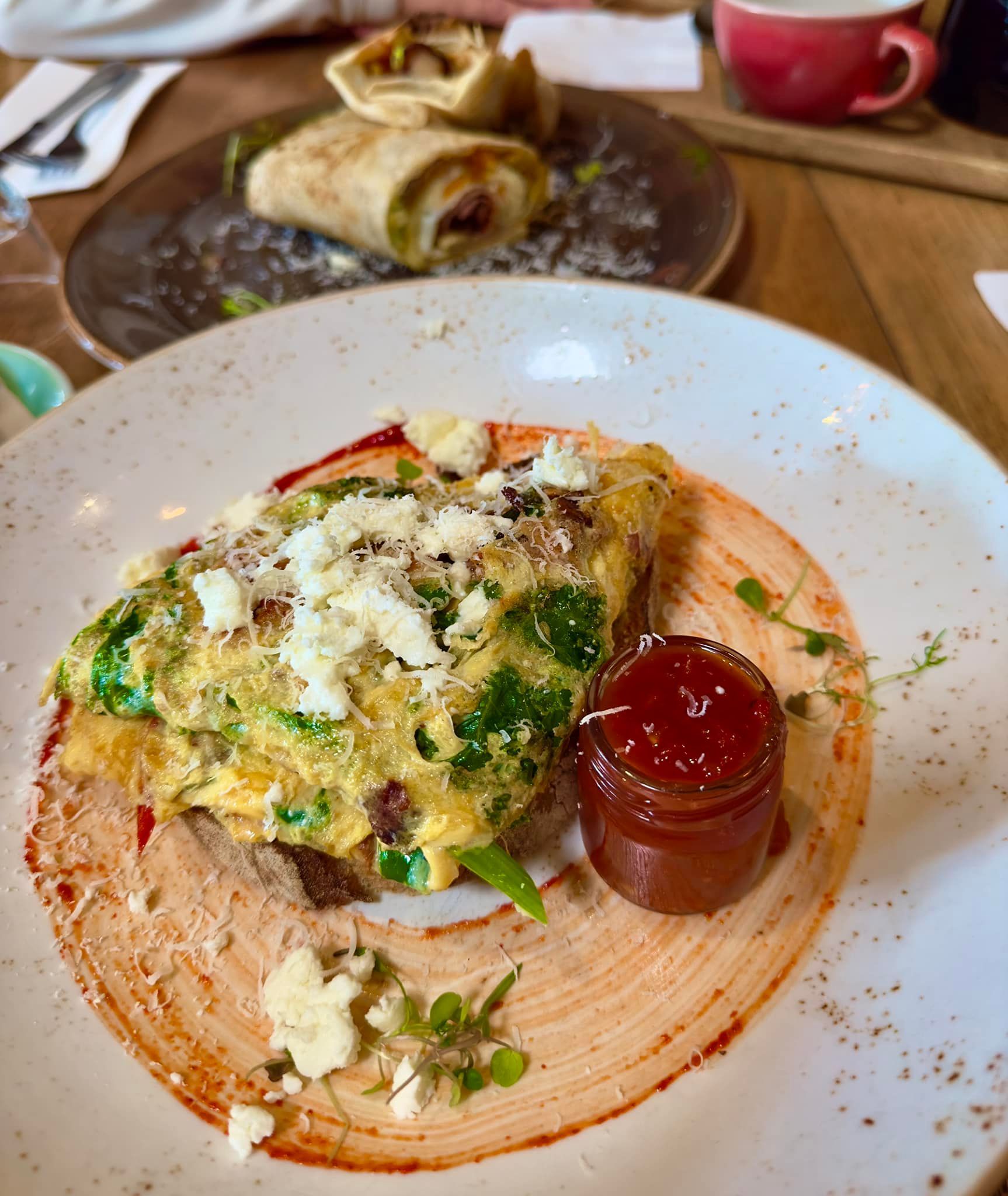 Locally inspired breakfast dish in Cairns, Queensland, featuring fresh ingredients and bold flavours — the kind of food experience you find on a Cairns food walking tour.