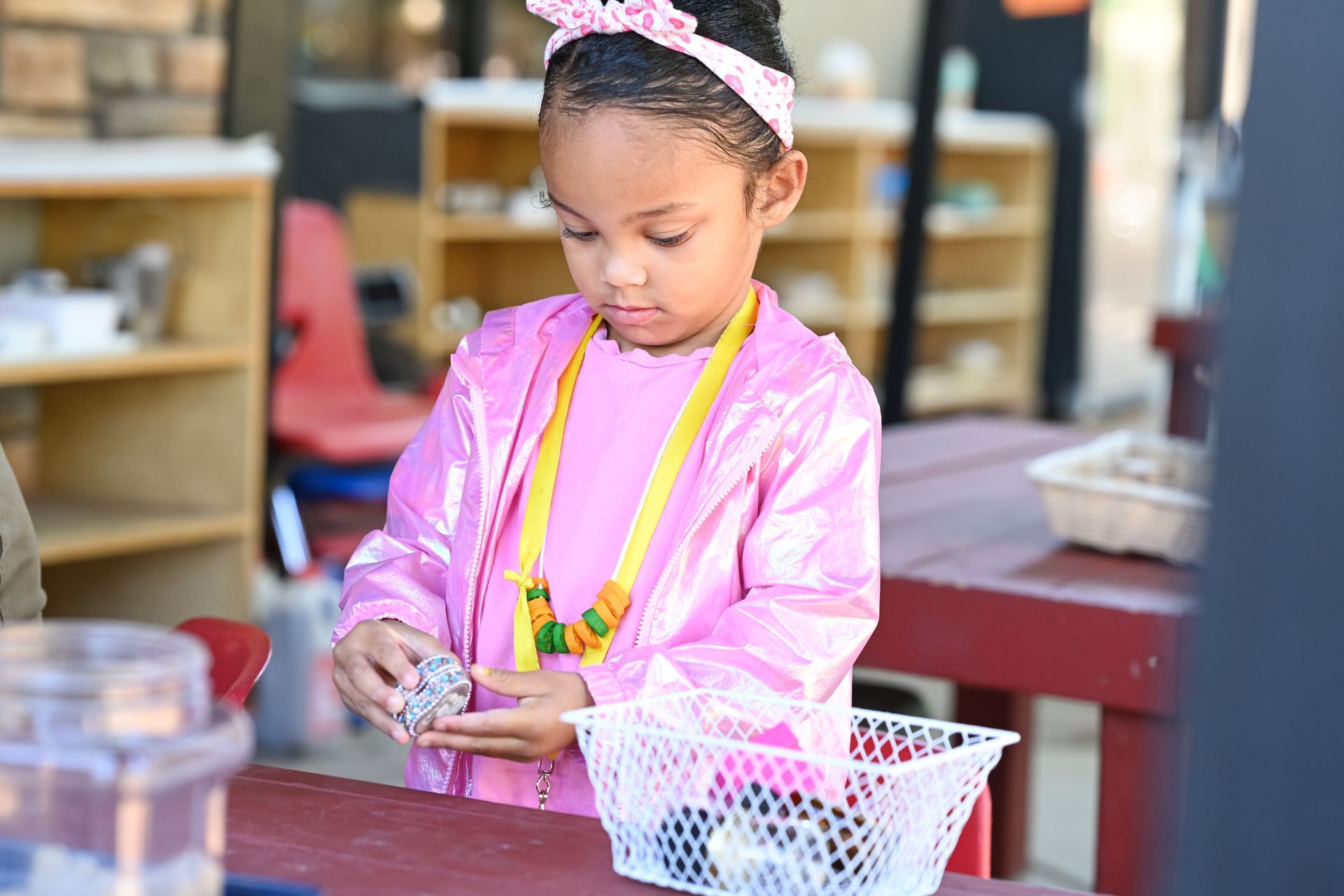 Montessori child working with Montessori materials