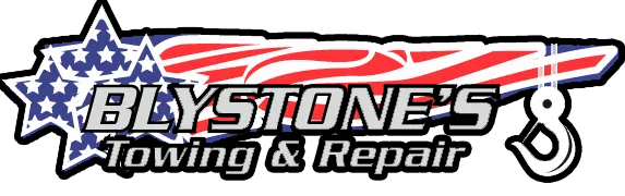 Logo for Blystone's Towing & Repair. Features a star with US flag design, name, and a tow hook.