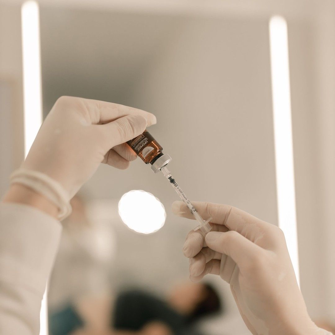 Preparing a peptide injection at Renewed Health and Wellness in Prospect, Connecticut