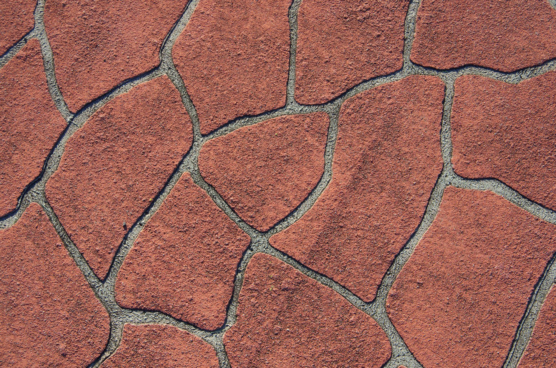 Stencilled Concrete Driveway In A Bush Rock Flagstone Pattern - Umina Beach - Stuart Concreting