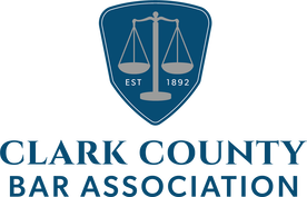 The clark county bar association logo has a scale of justice on it