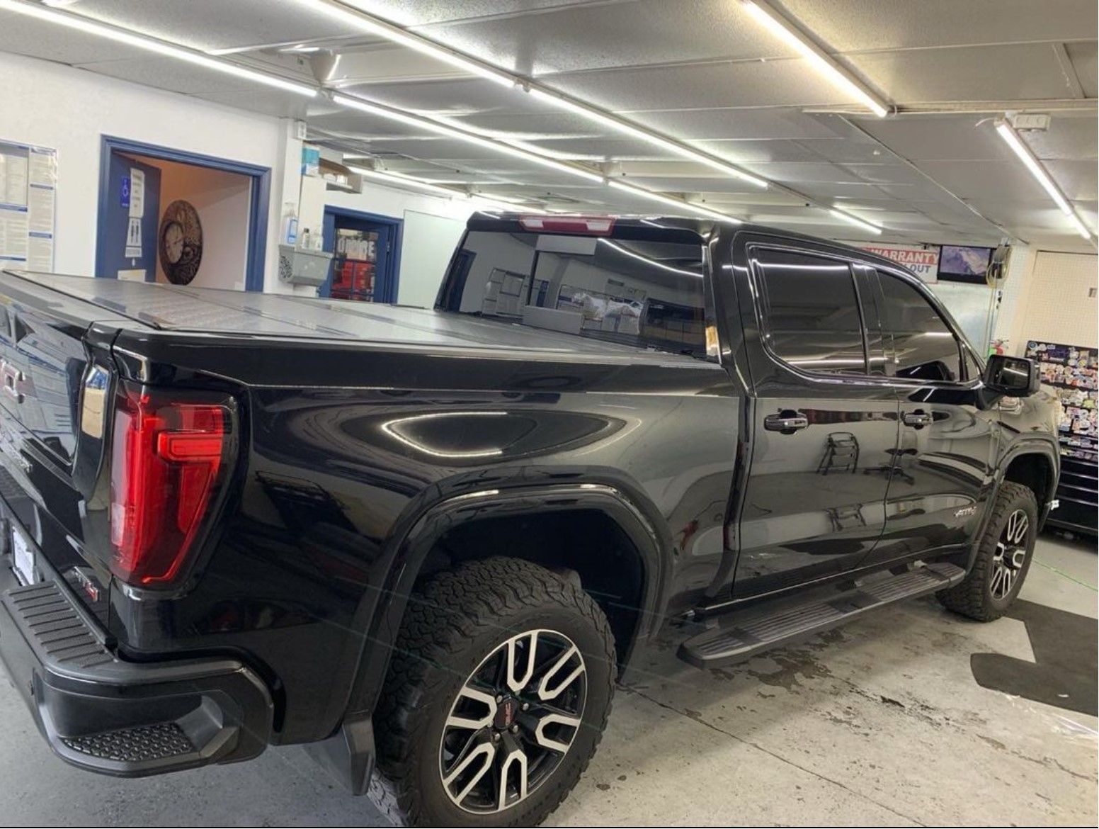 Window tinting a black pickup truck