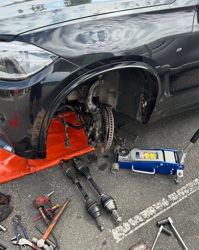Car With Front Wheel Removed After Collision, With Tools and a Jack on the Road — All Auto & Mechanical in The Entrance North, NSW