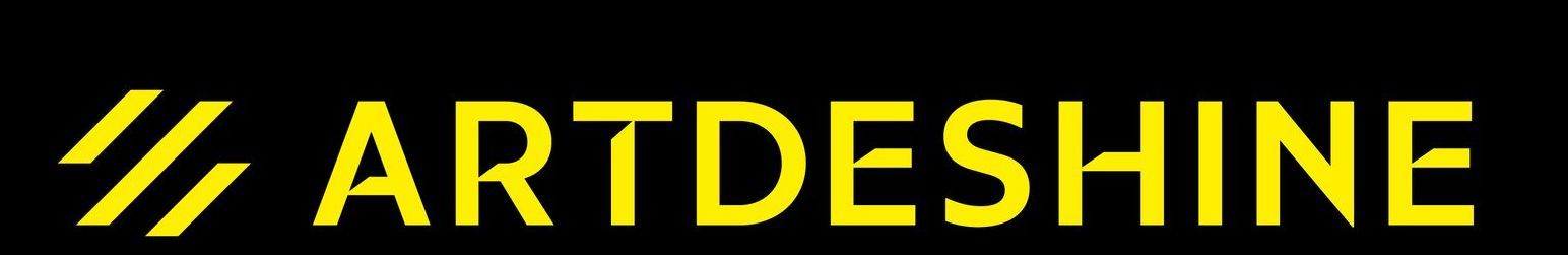 A black background with yellow letters that say artdeshine