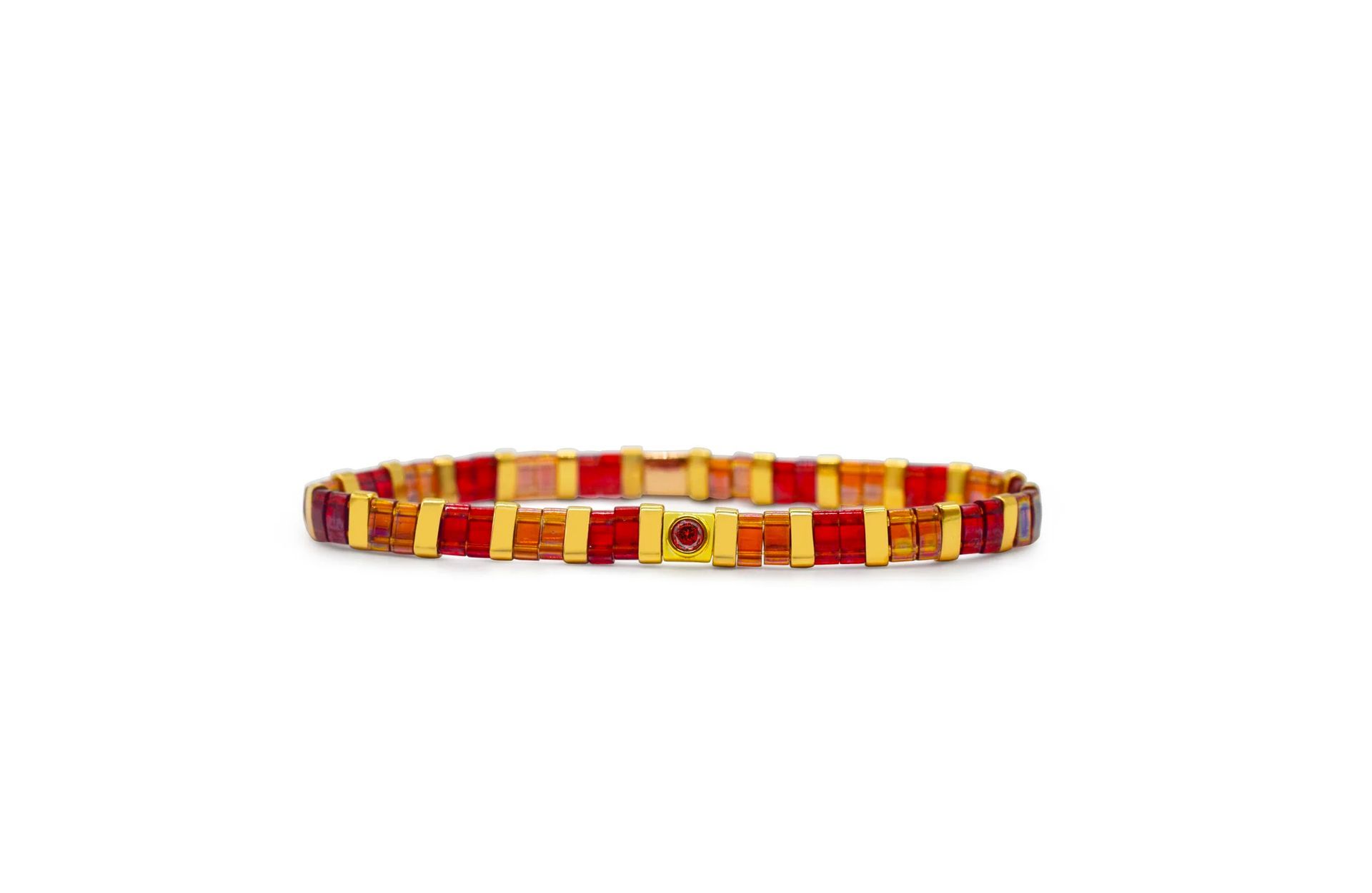 Red and yellow patterned woven bracelet on a white background