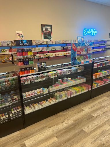 A store filled with lots of different types of e liquids.