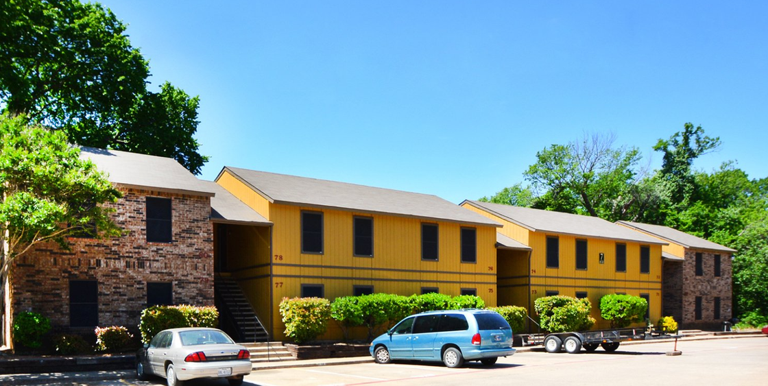 apartments with cars parked