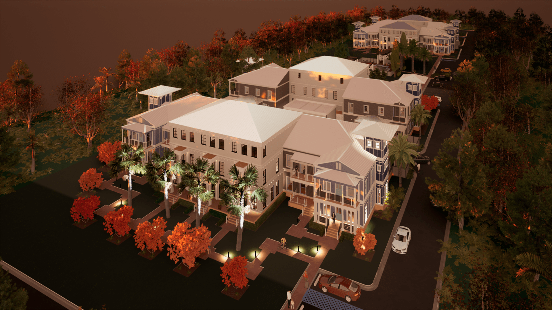 An aerial view of a large building surrounded by trees.