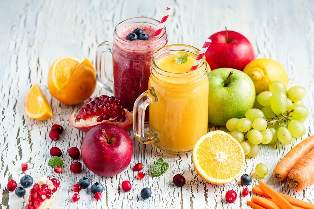 There are many different types of fruits and vegetables in this picture.