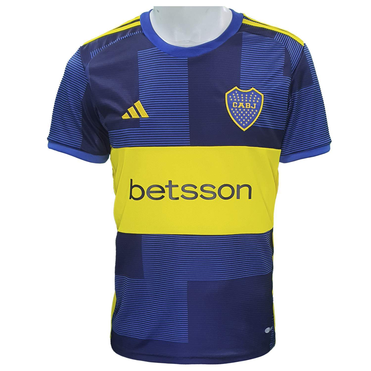 Camiseta de fútbol de Boca Juniors, color azul marino con franja horizontal amarilla y logo, patrocinador 