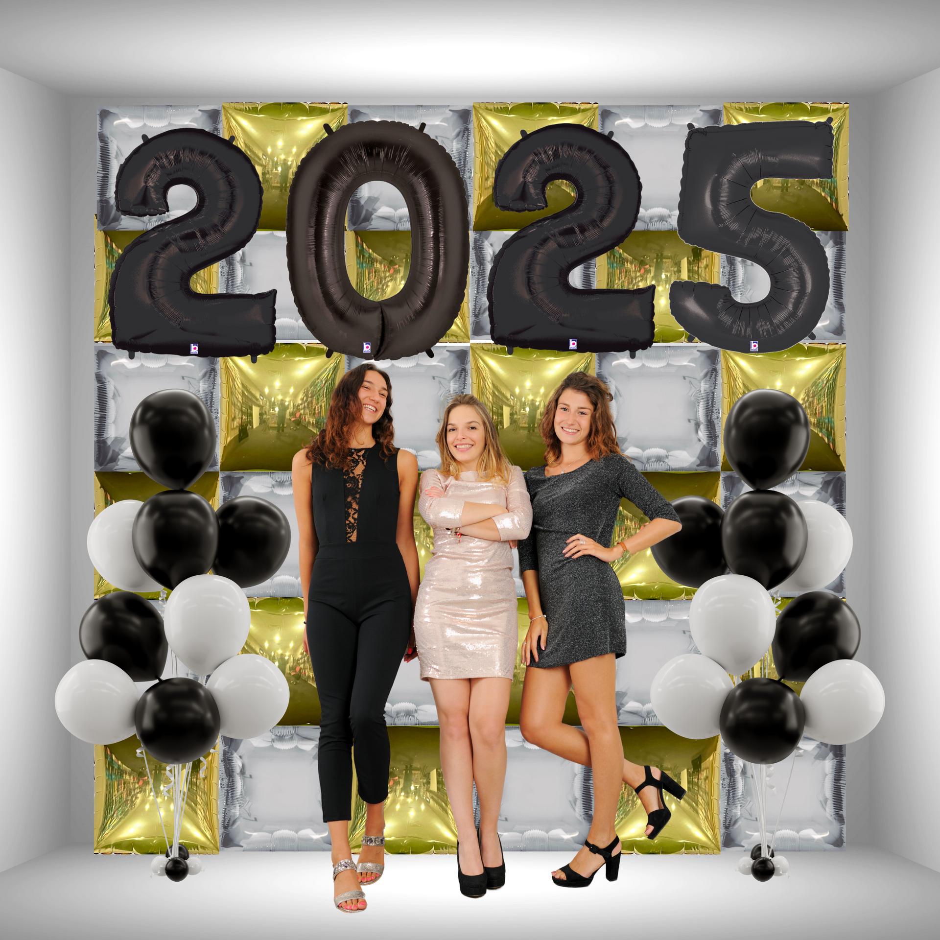 New Year’s 2025 foil balloon backdrop featuring black, white, and gold balloons for a party photo area