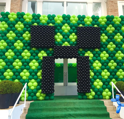 Custom balloon wall design inspired by Minecraft theme for party backdrop in Fort Worth Texas