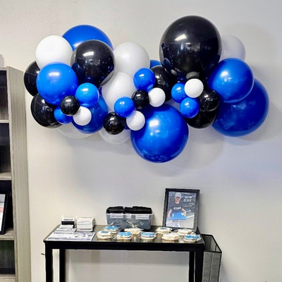 Grab and go balloon garland in blue black and white for easy party setup in Fort Worth Texas