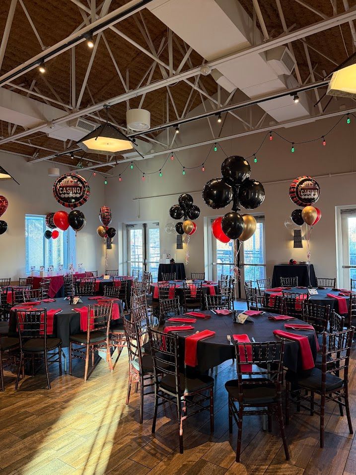 casino themed helium balloon centerpieces for a casino night party.