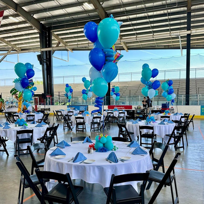 Balloon centerpieces with helium balloons for event table decor and party setups in Fort Worth Texas