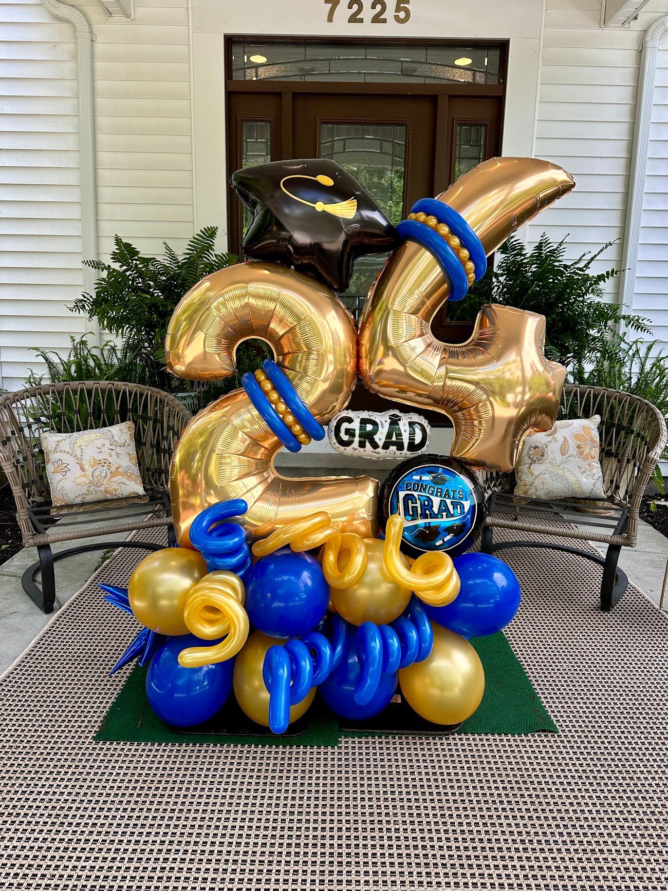 Graduation marquee balloon bouquet with gold numbers and balloons for class celebration Fort Worth