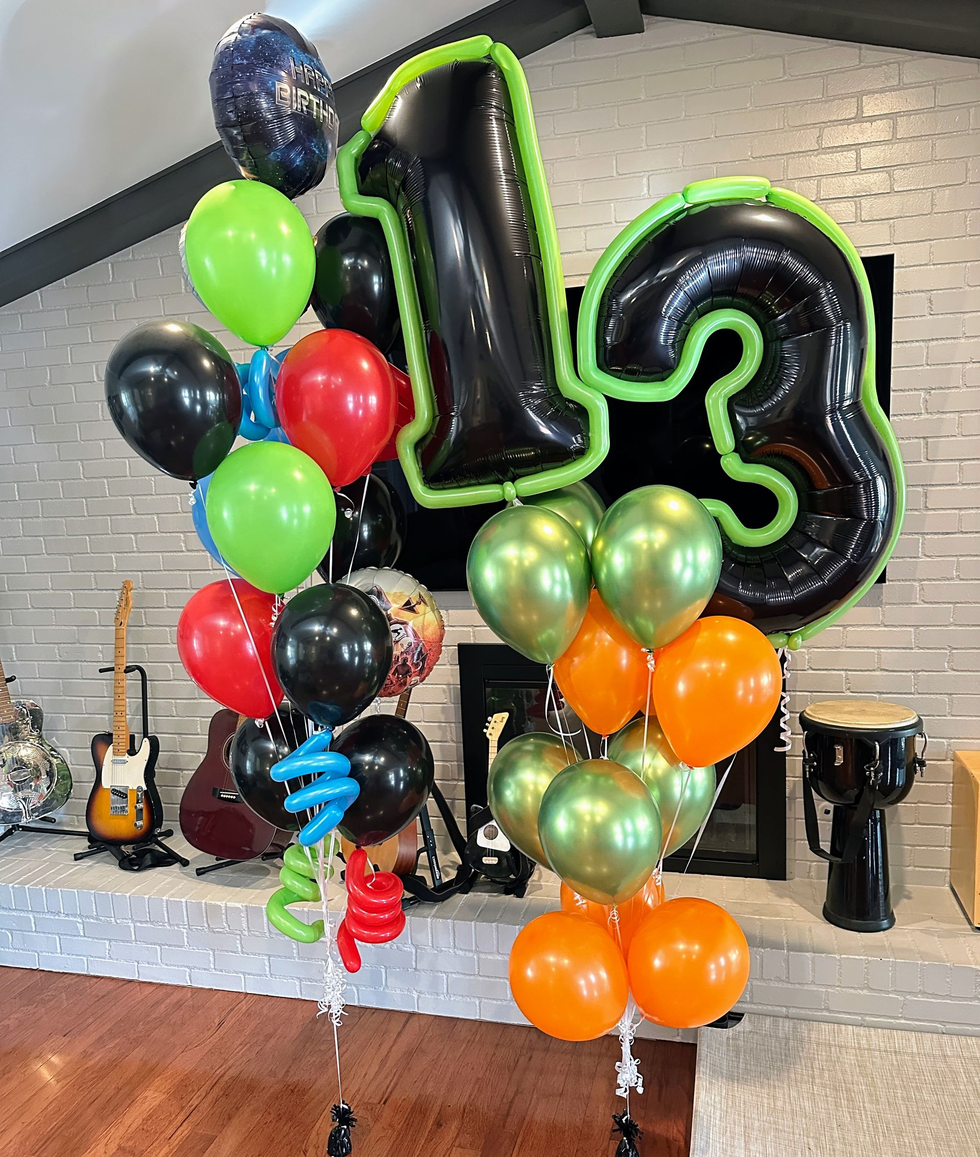 Helium balloon bouquet with number 13 foil balloons and colorful latex balloons for birthday party in Fort Worth