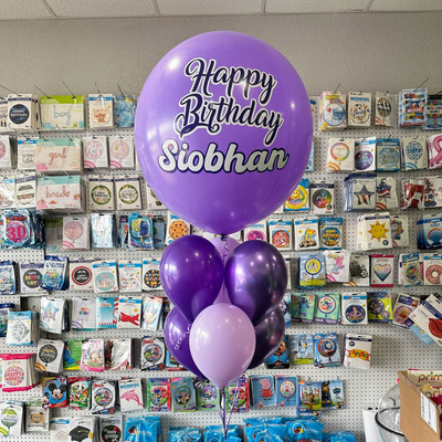 Personalized helium balloon bouquet with name for birthday celebration in Fort Worth Texas