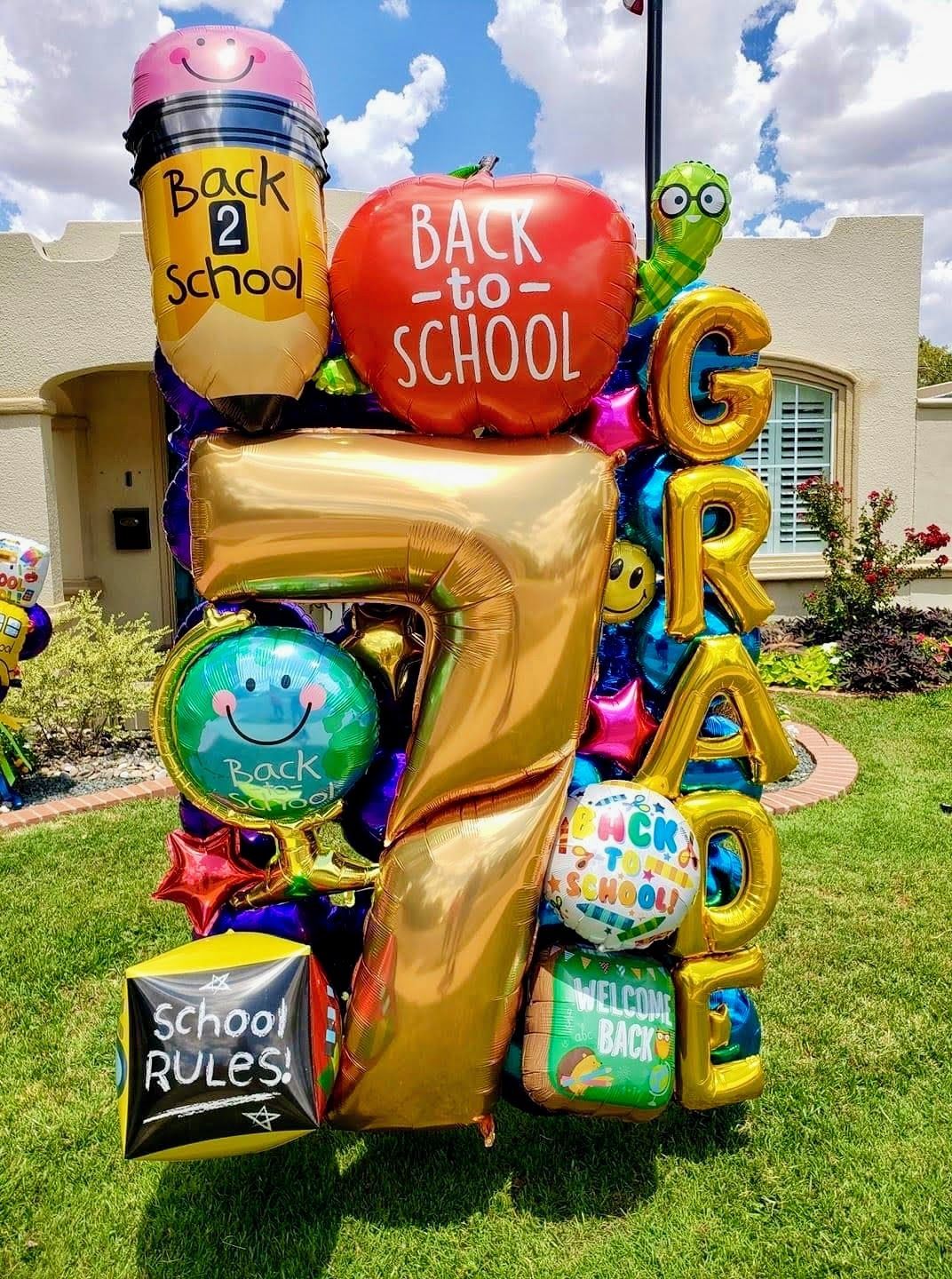 Close-up of back to school balloon bouquet with themed foil balloons and colorful latex balloons for school celebrations