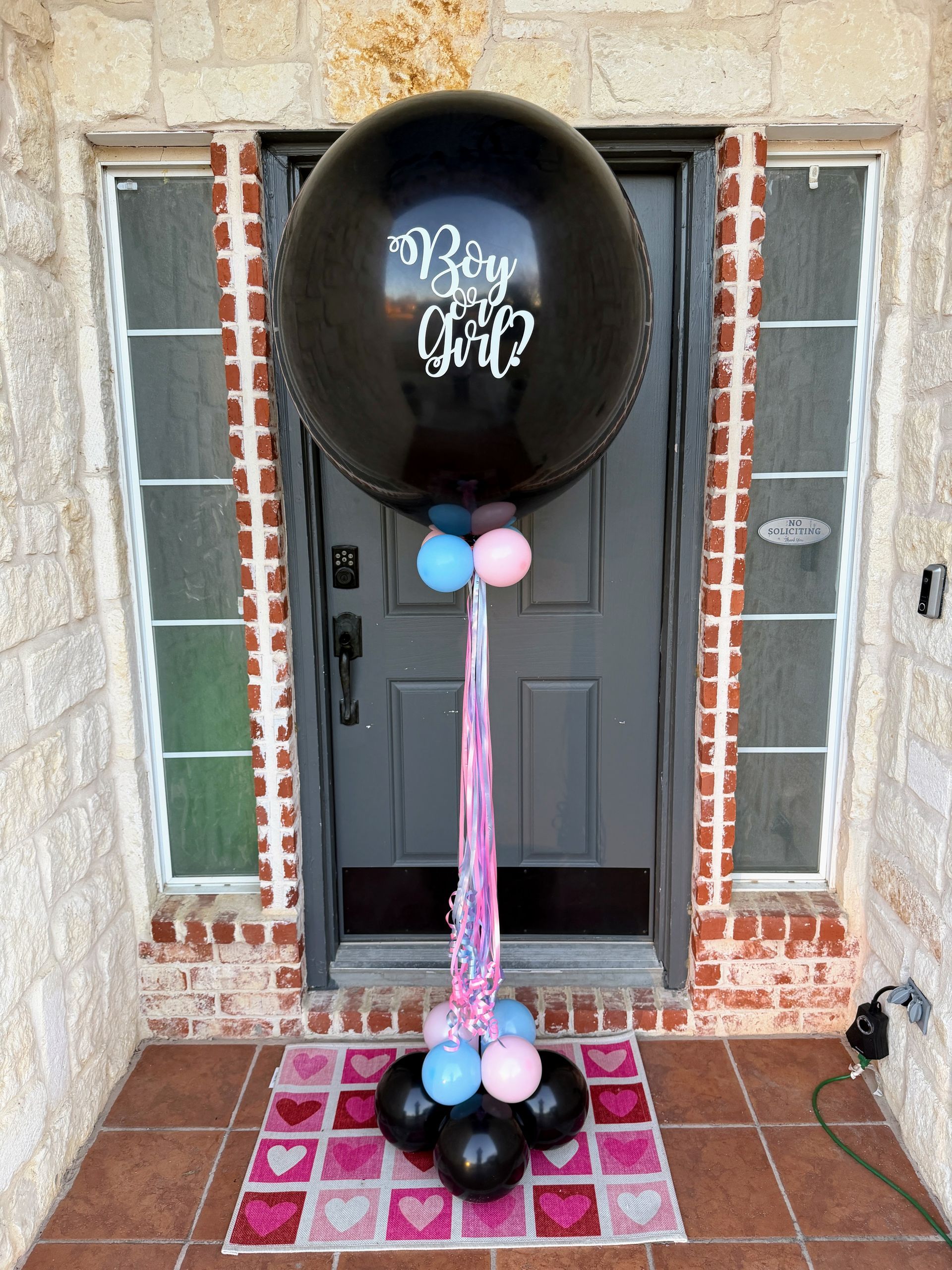 Black jumbo gender reveal balloon with “Boy or Girl” design for reveal party setup in Fort Worth Texas