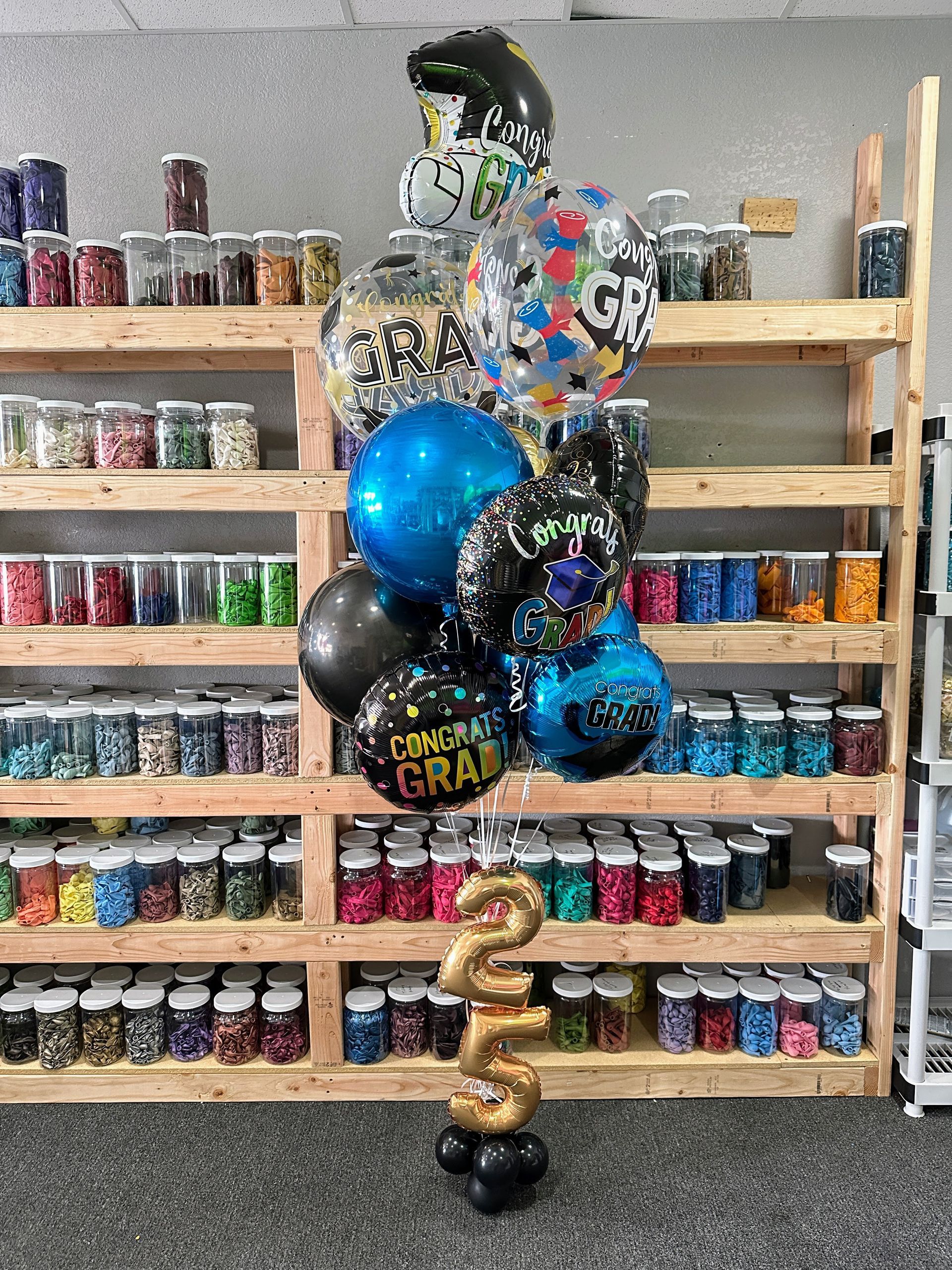 Graduation helium balloon bouquet with custom balloons for party decor in Fort Worth DFW