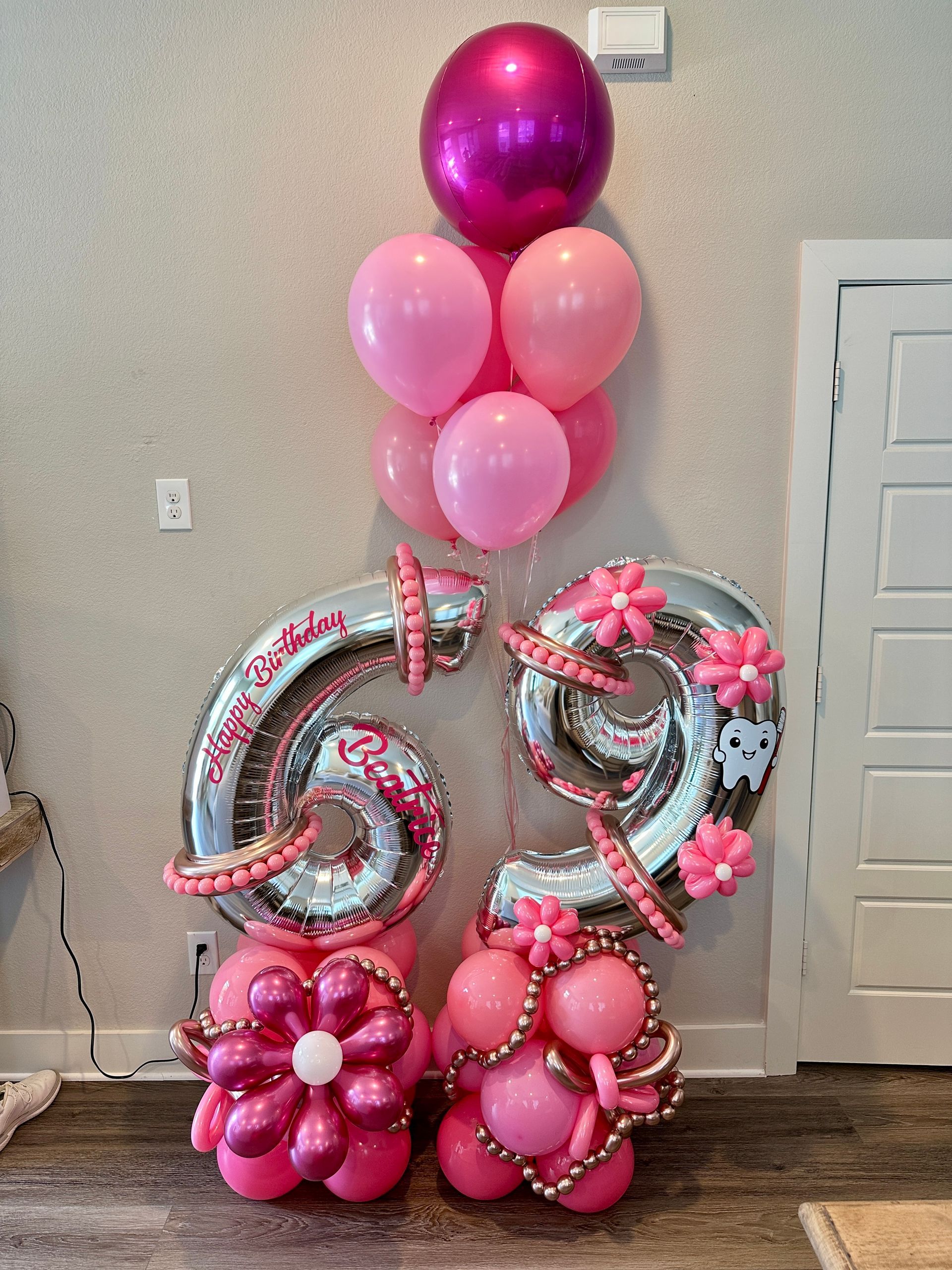 Dentist themed balloon marquee display for dental office events and grand openings