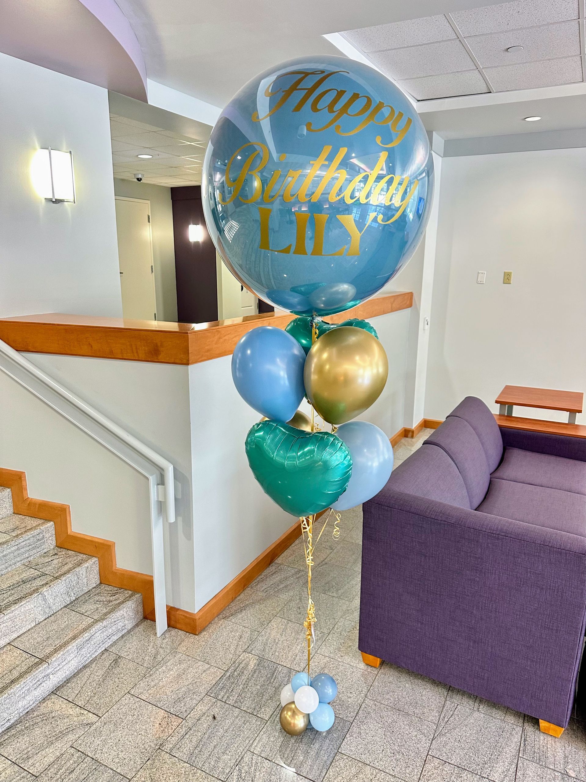 irthday jumbo balloon bouquet with personalized message and layered accent balloons, ideal for birthday parties