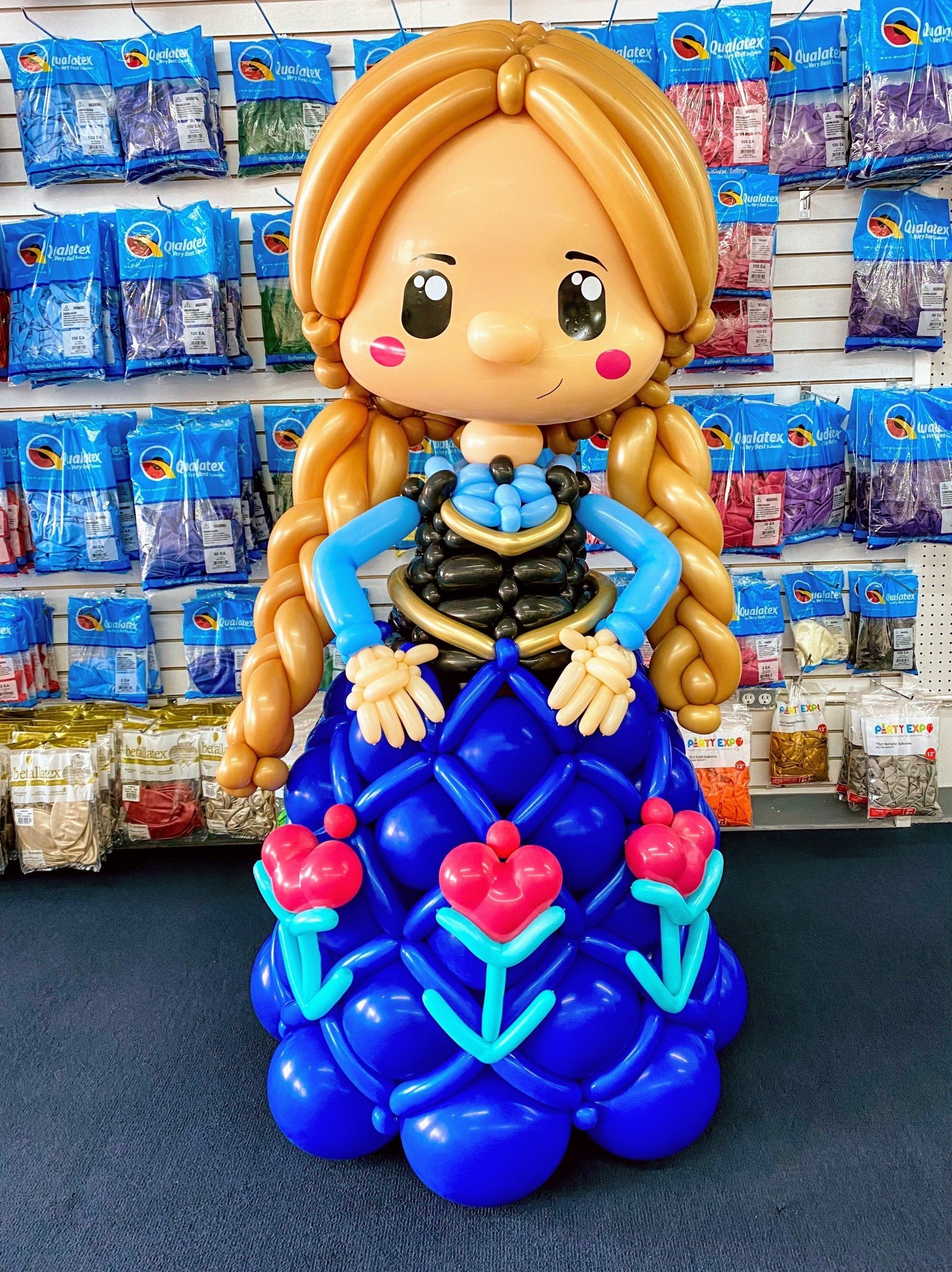 Custom princess balloon sculpture created for a children's birthday party, featuring character-inspired balloon artistry and event entertainment decor.