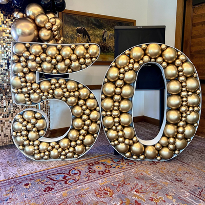 Balloon mosaic numbers 50 with gold balloons for birthday or anniversary celebration in Fort Worth Texas