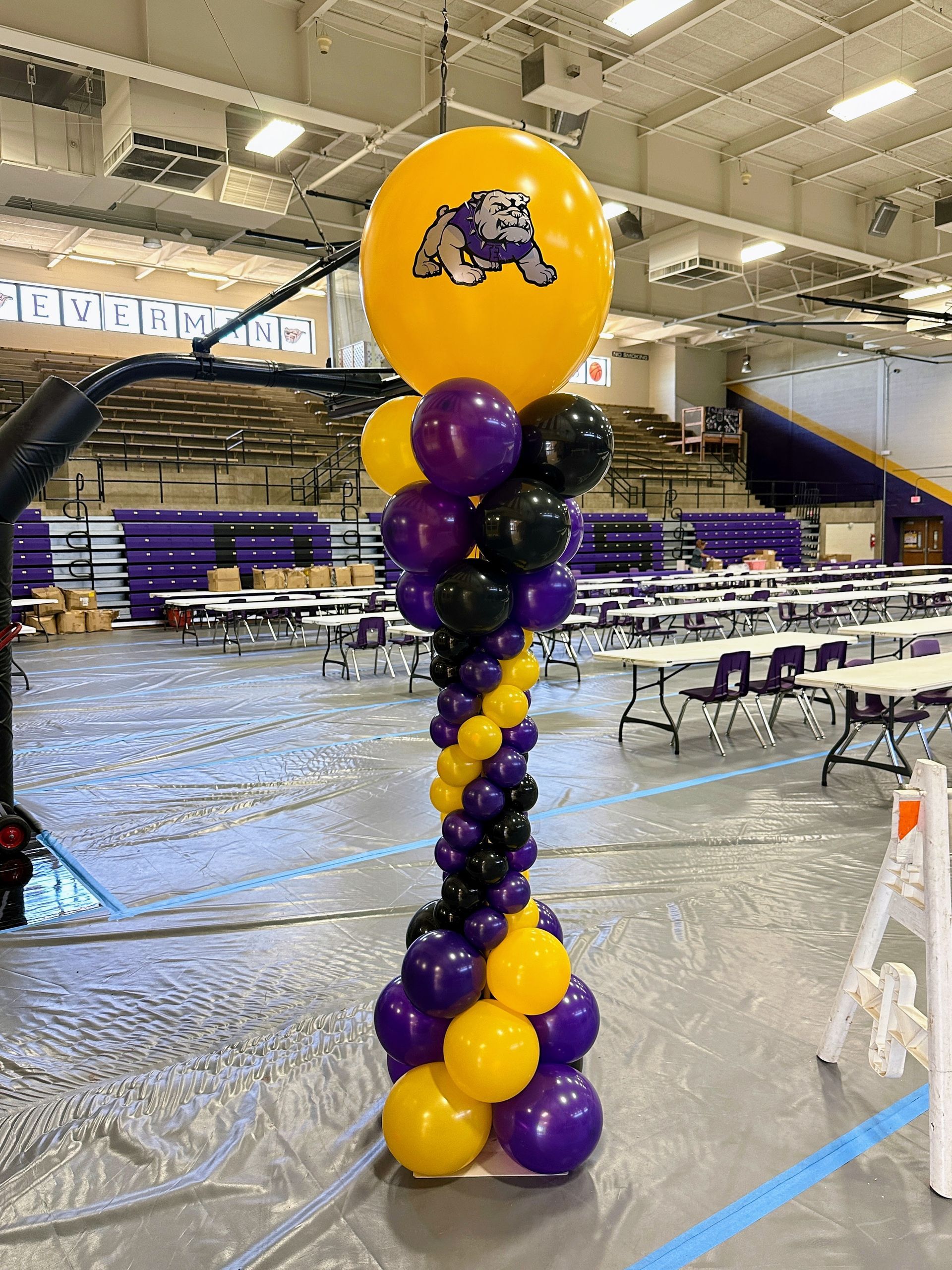 School spirit balloon installation with custom balloon designs for school celebrations, open houses, and welcome-back events