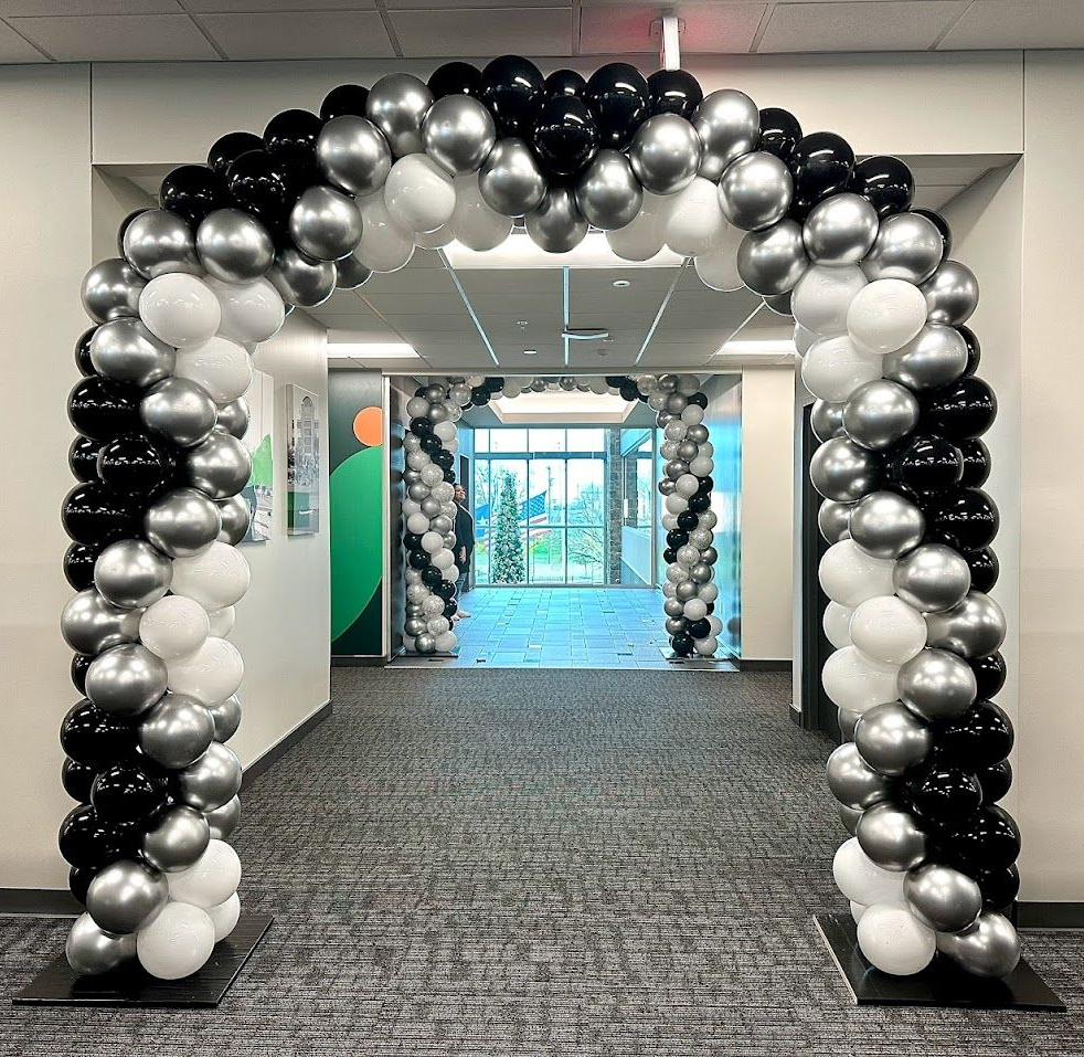 Graduation balloon arch in black white and silver for school event entrance in Fort Worth Texas