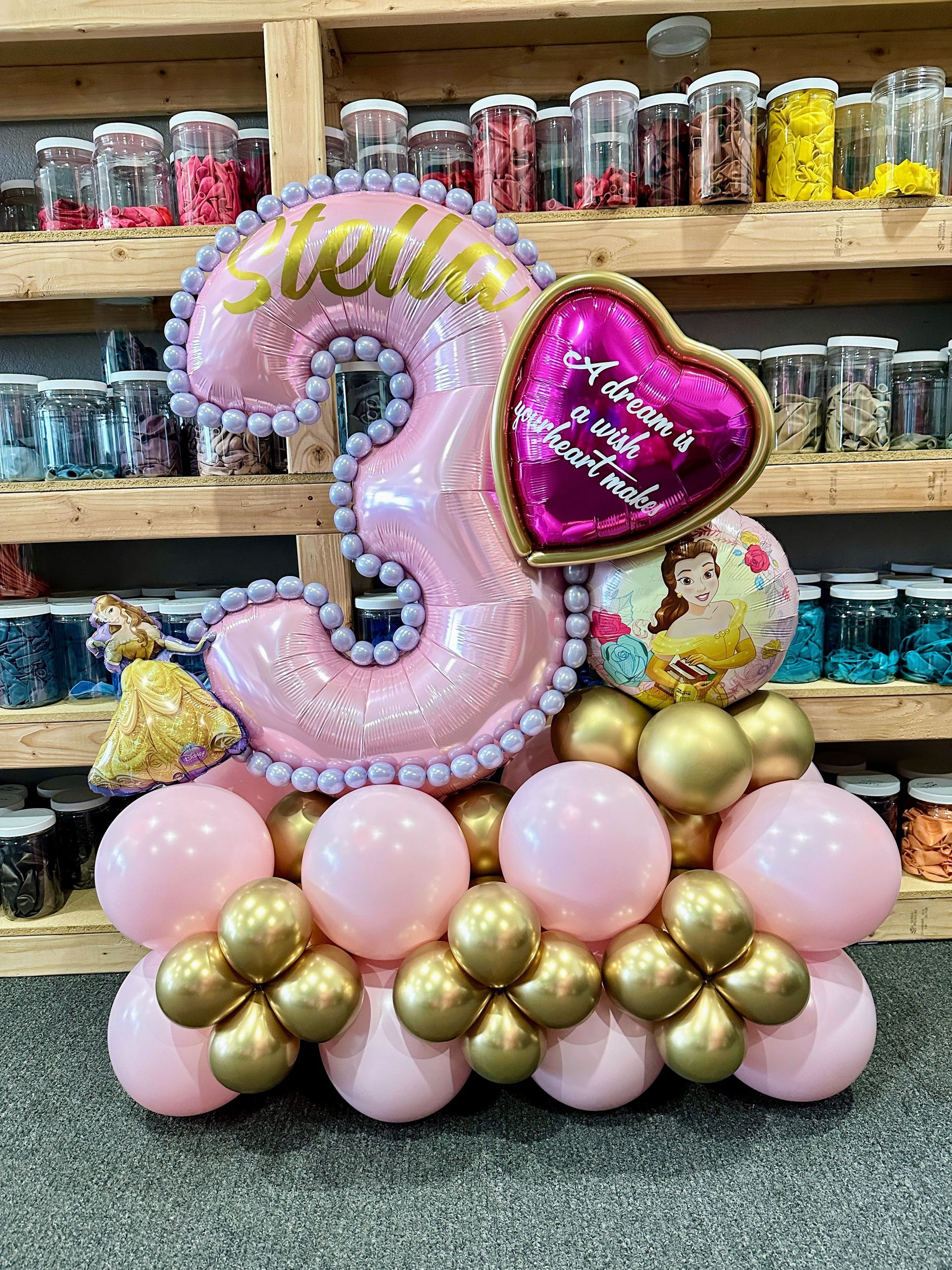 Elegant number balloon marquee bouquet with pearl accents for upscale birthdays and special events