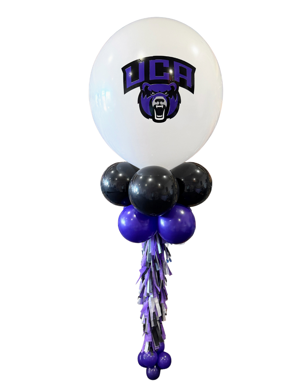 Jumbo white balloon column with black and purple balloons with purple, black and white tassels.