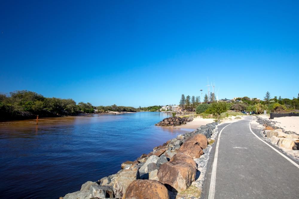 A Road Leading to a Body of Water Next to a Body of Water — Kymar Steel Fabrications in Central Coast, NSW