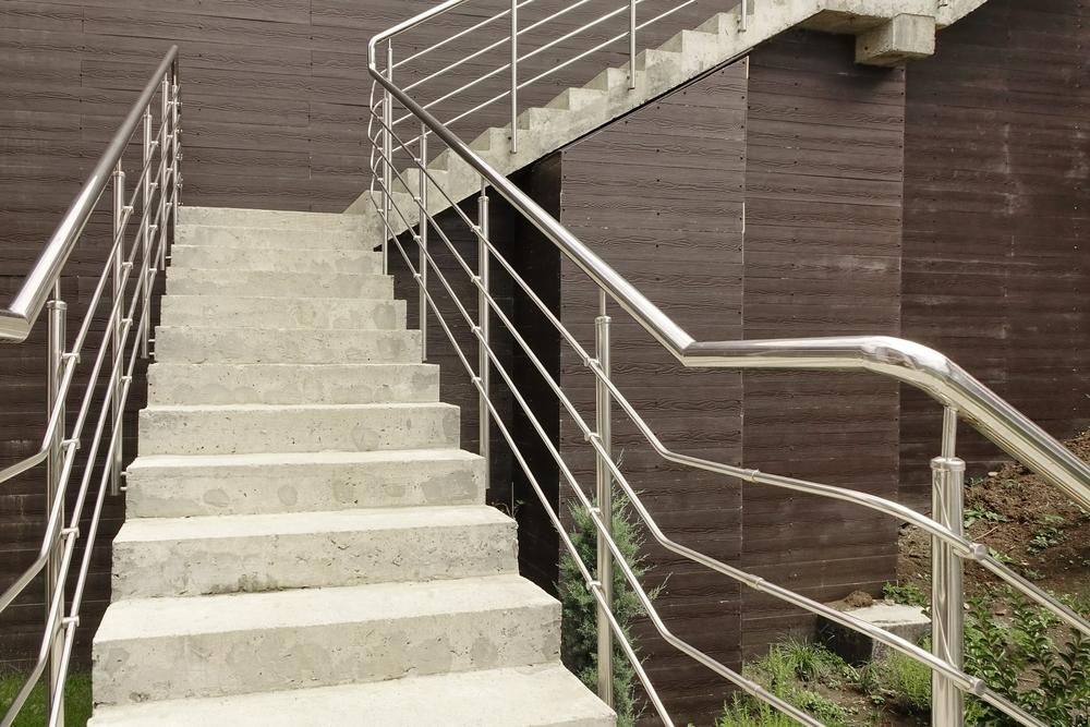 A Set of Stairs With a Stainless Steel Railing — Kymar Steel Fabrications in Teralba, NSW