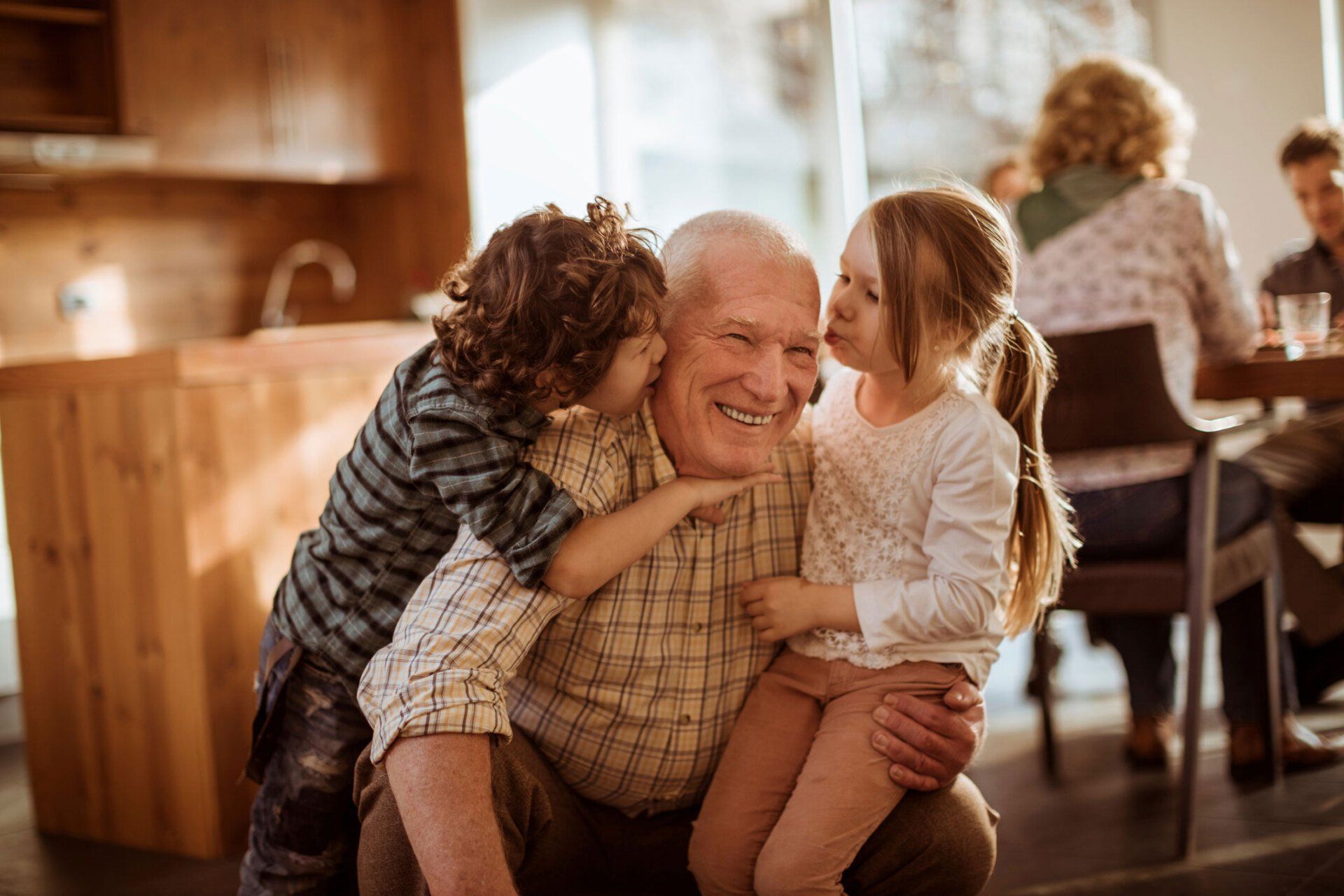 Grandfather Playing With His Grandkids | Sacramento, CA | Neubite Denture Center Grandfather Playing With His Grandkids | Sacramento, CA | Neubite Denture Center