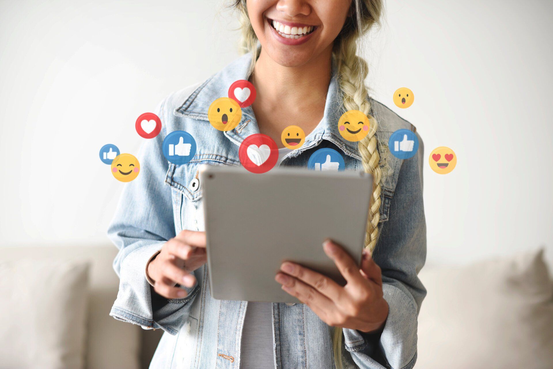 Social media marketing manager analyzing engagement on tablet