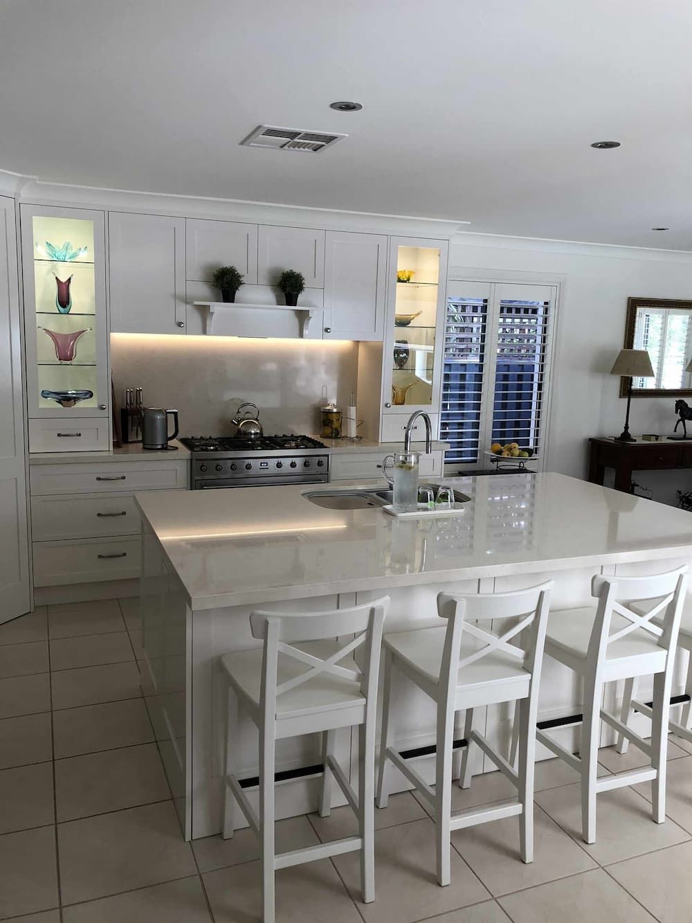 There Is A Large Island In The Middle Of The Kitchen — Cross Cabinets In Chevallum, QLD