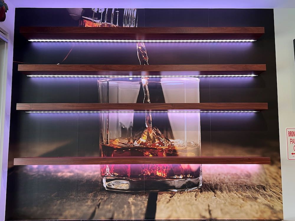 A Shelf With A Picture Of A Bottle Of Whiskey On It — Cross Cabinets In Chevallum, QLD