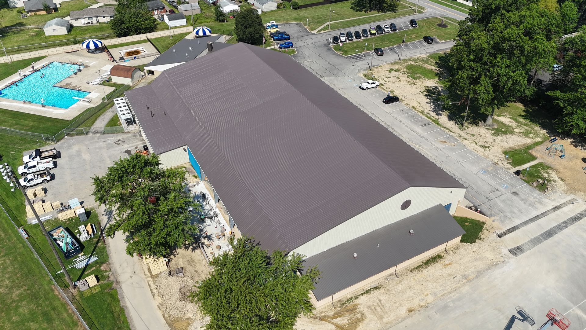 Finished silicone roof coating system installed over metal roof in Elyria, Ohio in 2025.