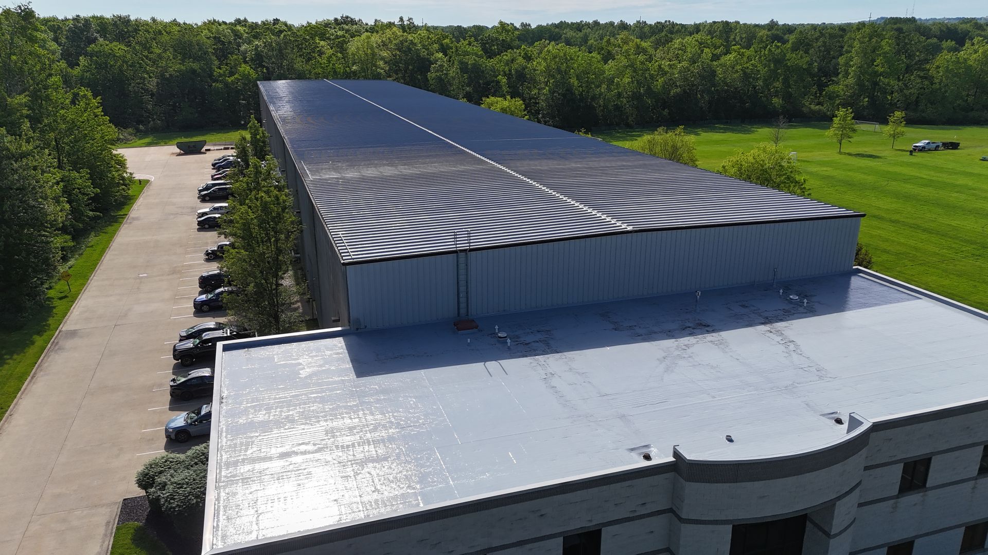 Roof coating system installed on commercial metal roof at Bearing Manufacturing in Ohio